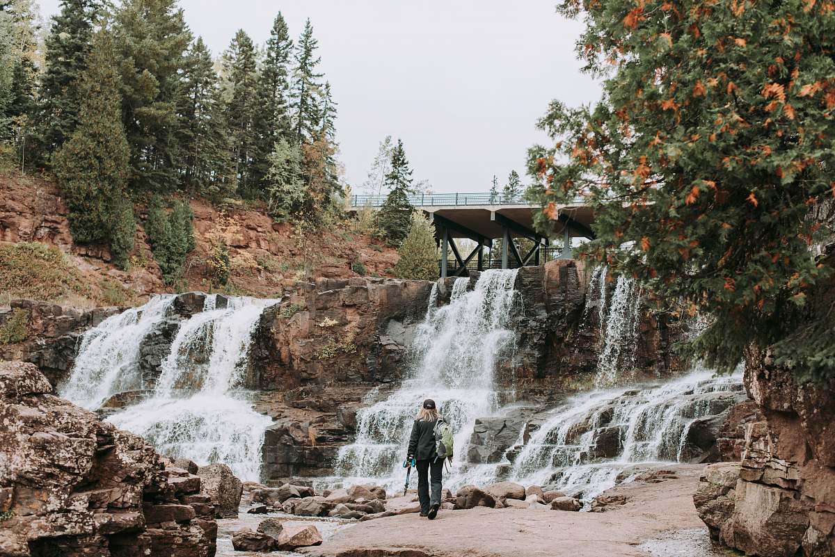 gooseberry falls state park person near waterfalls two harbors